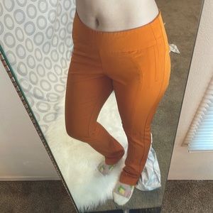 Orange skinny leg structured mid rise trousers